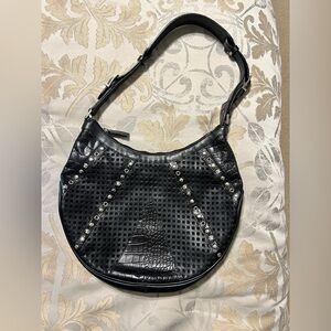 Versace leather bag with handle to carry.